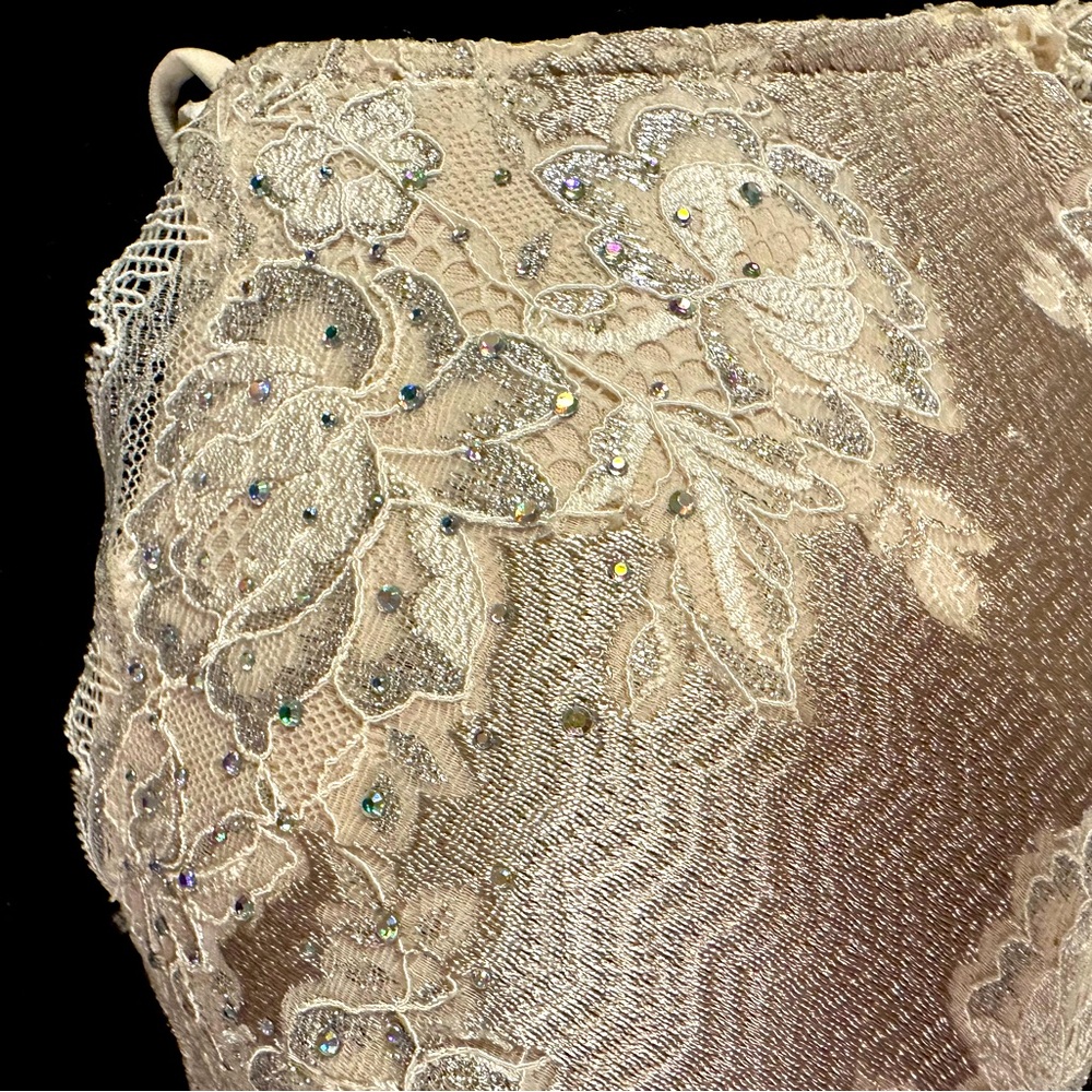 Champagne color bra  with rhinestone embellishments.